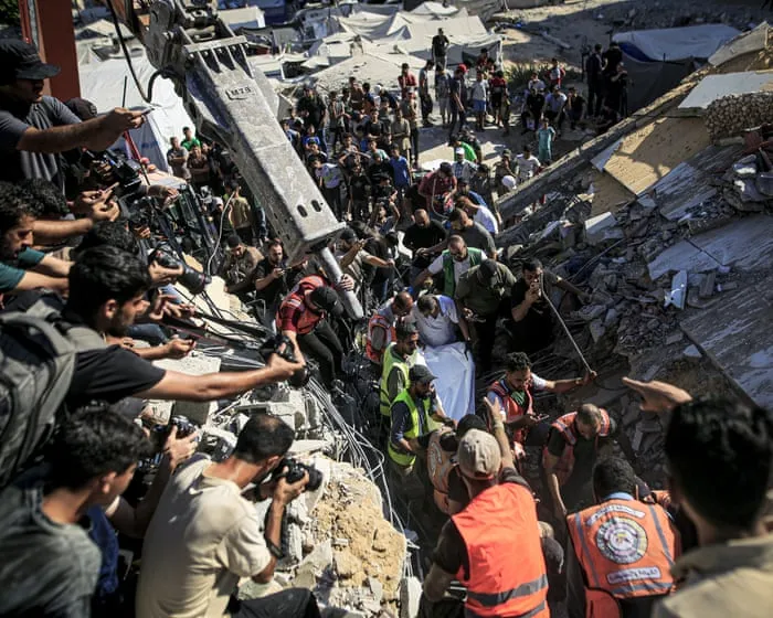 At least 21 killed after Israeli-hit building in Gaza City collapses