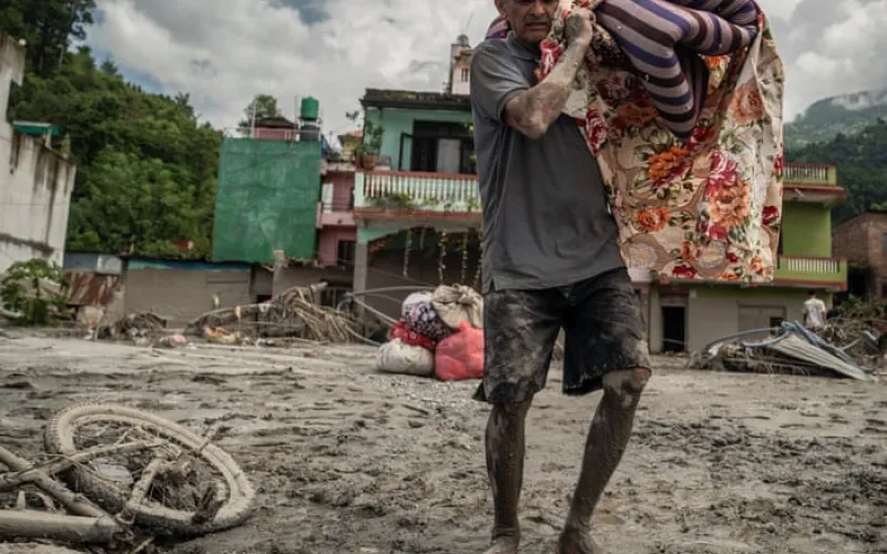 Devastated by floods and overwhelmed by bodies, Nepalis weep for what remains of their homes
