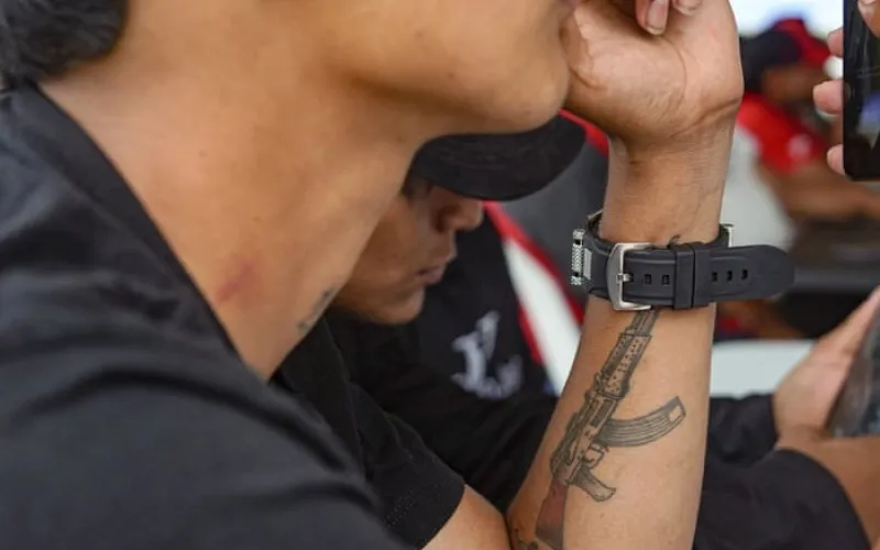 Was it a mistake for 99 Colombian guerrillas to lay down their arms?
