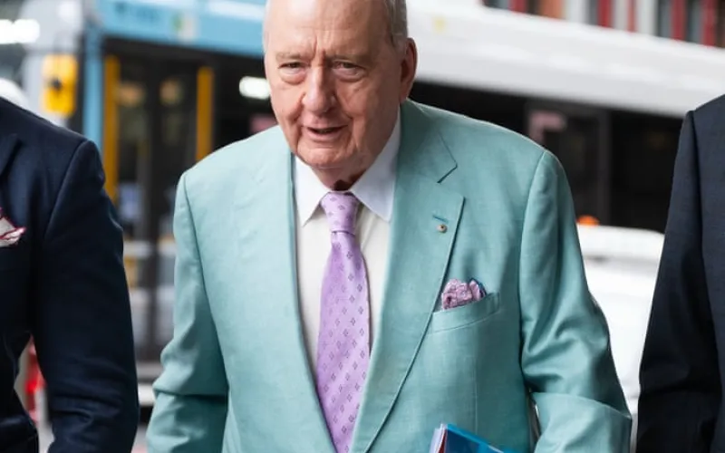 Alan Jones welcomed prominent athlete to luxury home with ‘hug and slap on the bottom’, former butler tells court