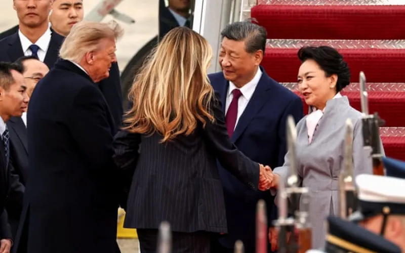 Trump greets Xi Jinping on arrival in rare move as US-China trade truce extended