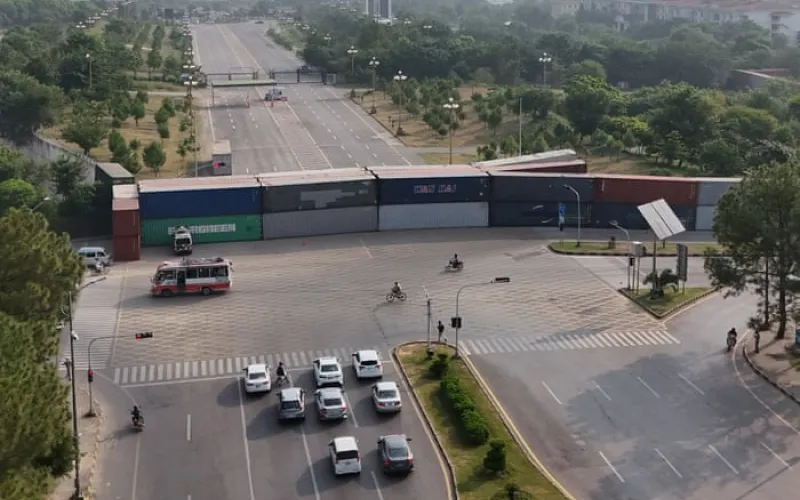Pakistan locks down Islamabad as Imran Khan’s party vows to march on capital